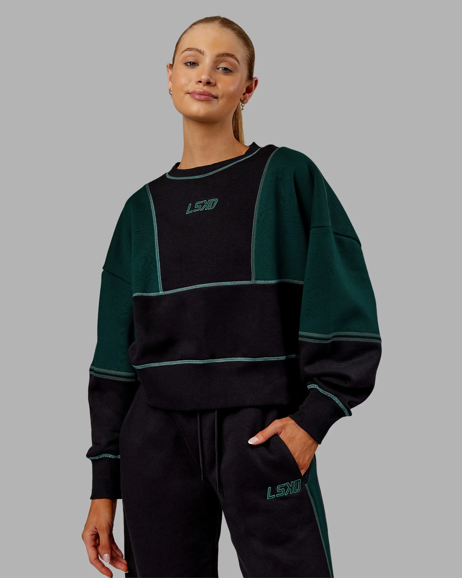 9529-stitch-up-oversized-fleece-sweater-black-dark-moss-1.webp Stitch Up Oversized Fleece Sweater - Black-Dark Moss
