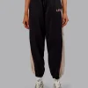 9586-stitch-up-fleece-sweat-pant-black-shale-beige-1.webp Stitch Up Fleece Sweat Pant - Black/Shale Beige
